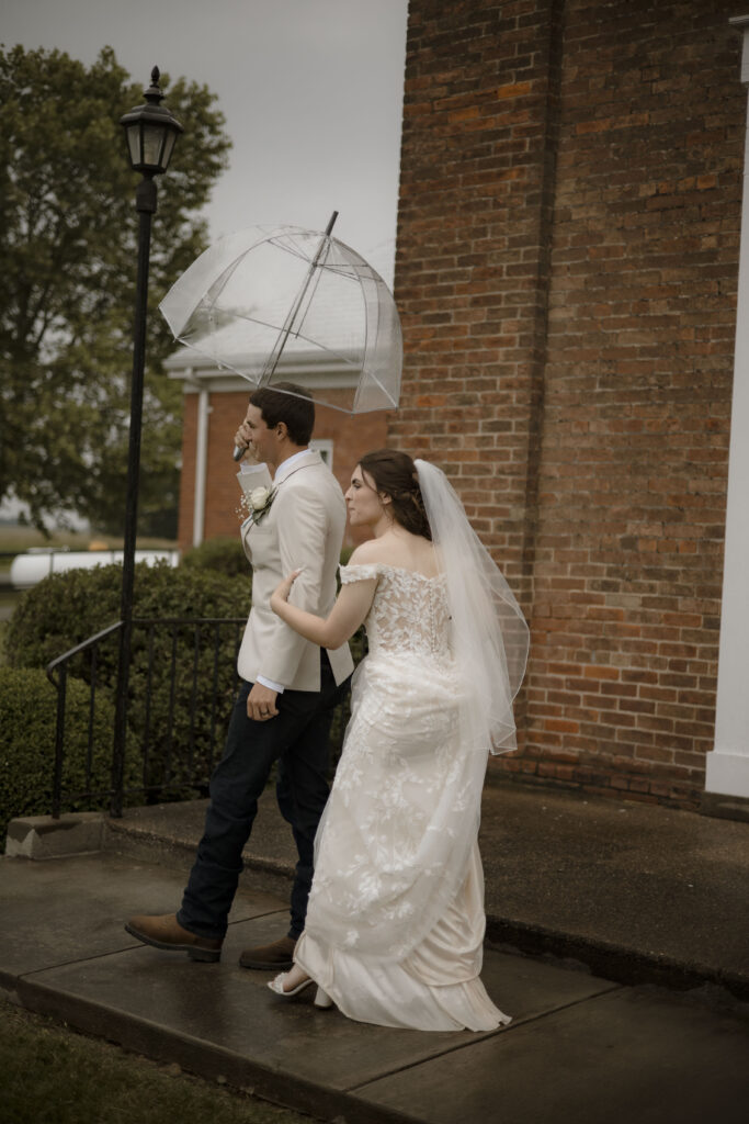 Callie and Matt walk towards the parking lot after their ceremony 