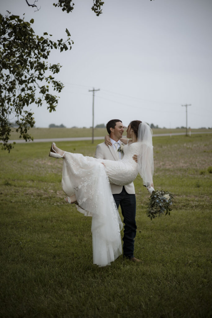 Matt picks Callie up in a field