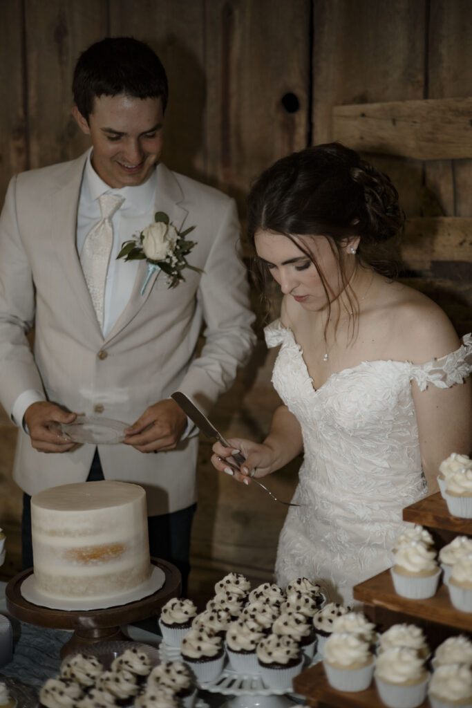 Callie and Matt prepare to cut their wedding cake
