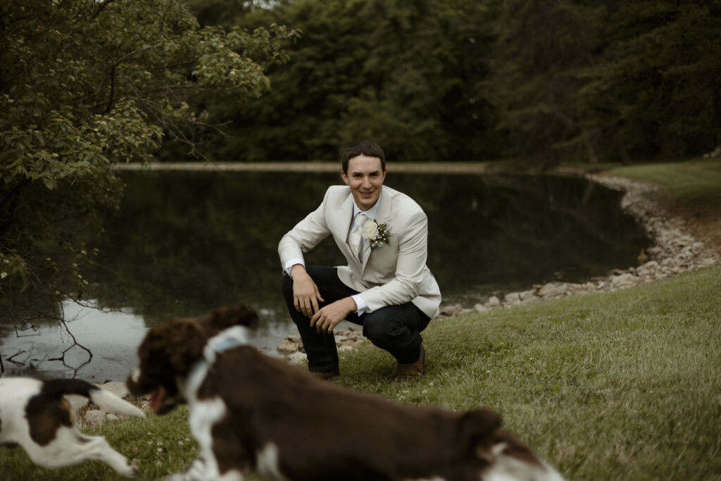 Matt spends some quality time with the pups before the ceremony