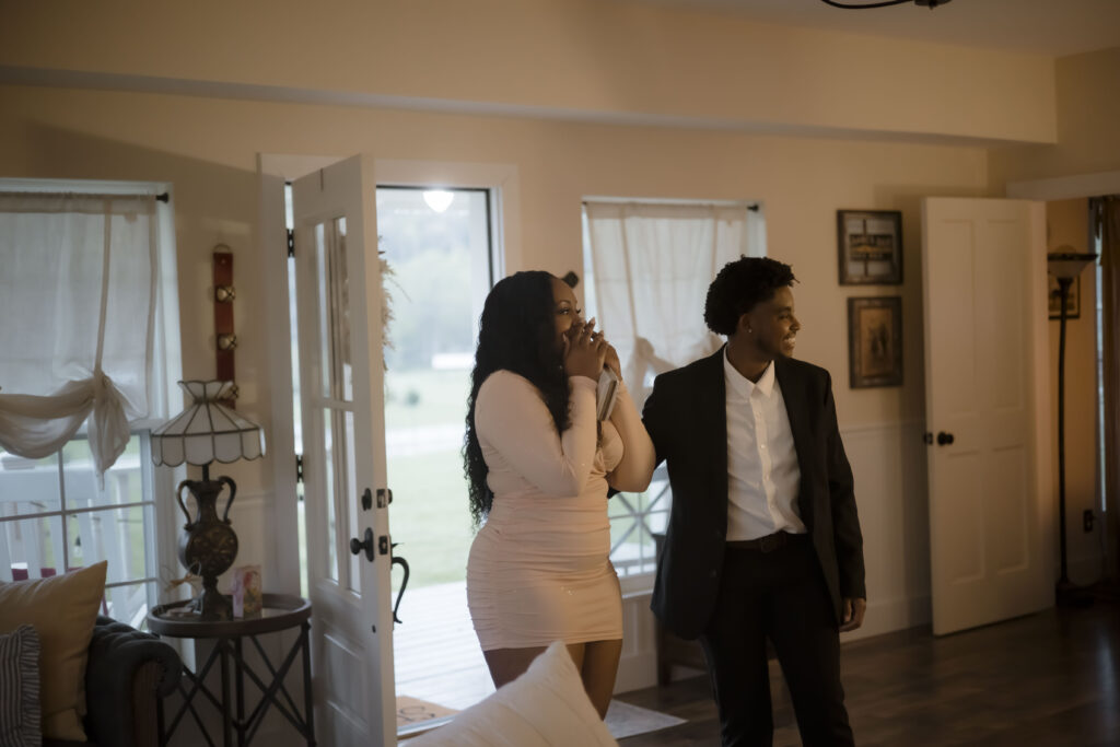 Kiki is surprised by the beautiful scene set for her as she enters the farmhouse