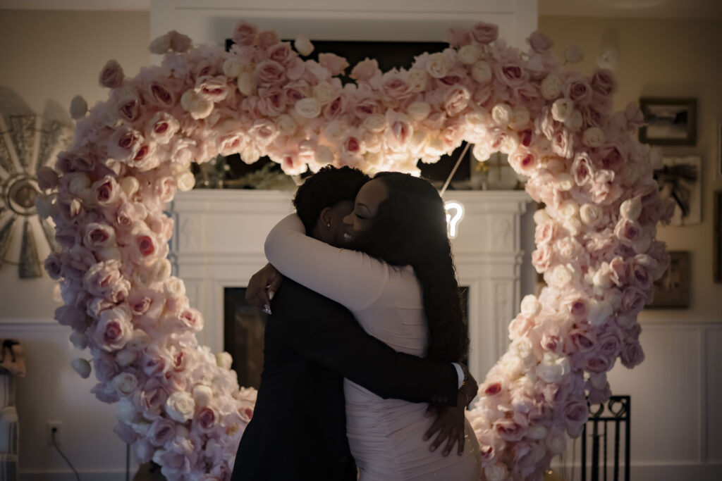 Chris and Kiki embrace. She said yes!