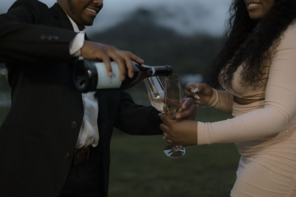 Chris pours the champagne